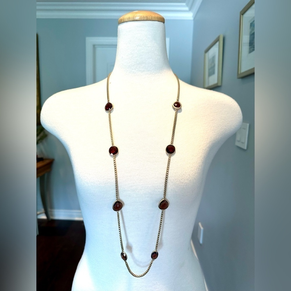 ANNE KLEIN Long Matte Brass-Coloured Flat Cut Garnet Necklace